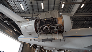 Opened engine for inspection on airframe